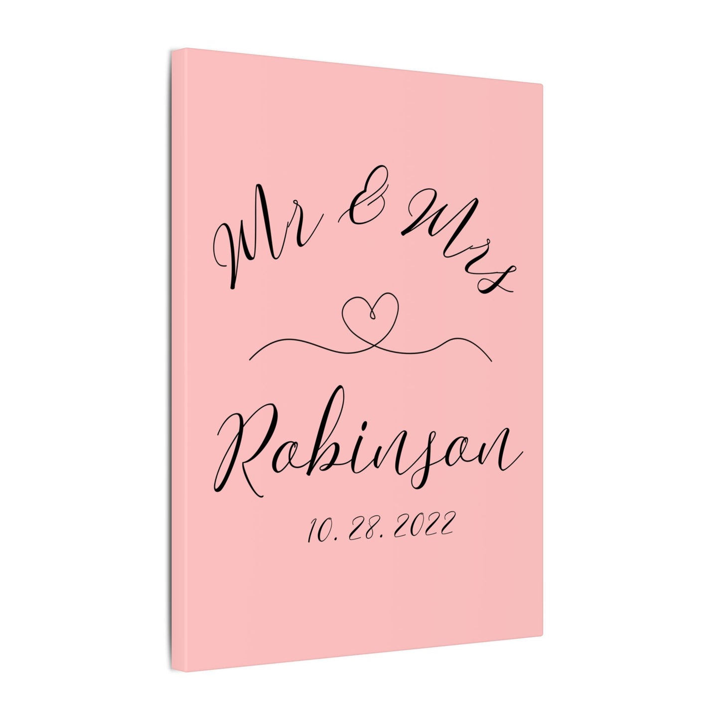 Customized minimal pink Decorative wall art with 'Mr & Mrs Robinson' on a pink backgroundromantic gift for newly weds, anniversary and valentine's day against a white background side view
