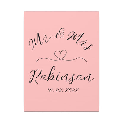 Customized minimal pink Decorative wall art with 'Mr & Mrs Robinson' on a pink backgroundromantic gift for newly weds, anniversary and valentine's day against a white background front view