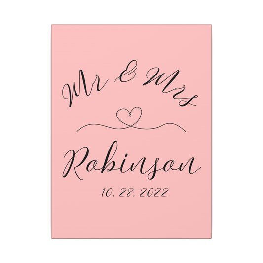 Customized minimal pink Decorative wall art with 'Mr & Mrs Robinson' on a pink backgroundromantic gift for newly weds, anniversary and valentine's day against a white background front view