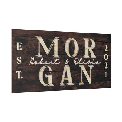 Luxurious living room with a large customized rustic wooden sign with name and year " MORGAN 2021" with couple names against a white background side view